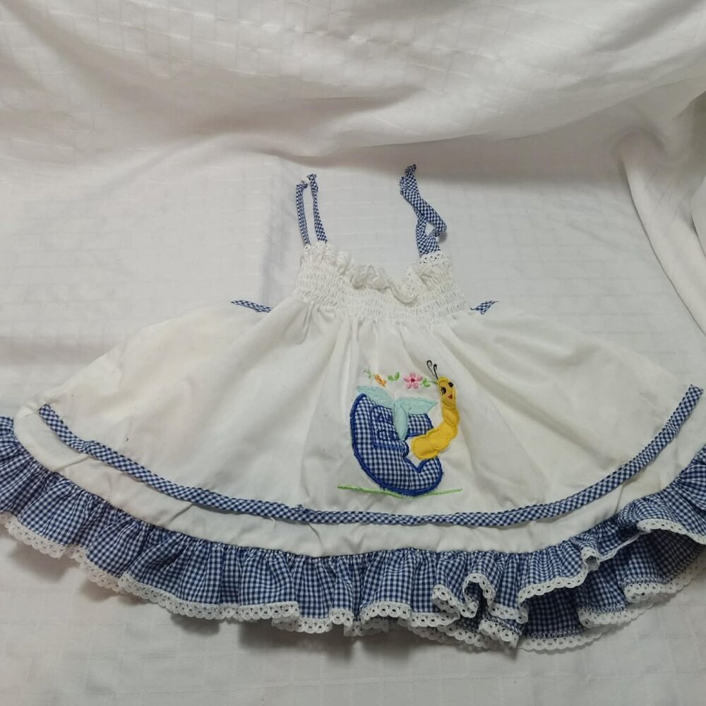 Pretty blue and white cotton jumper dress with embroidery with lace-up straps